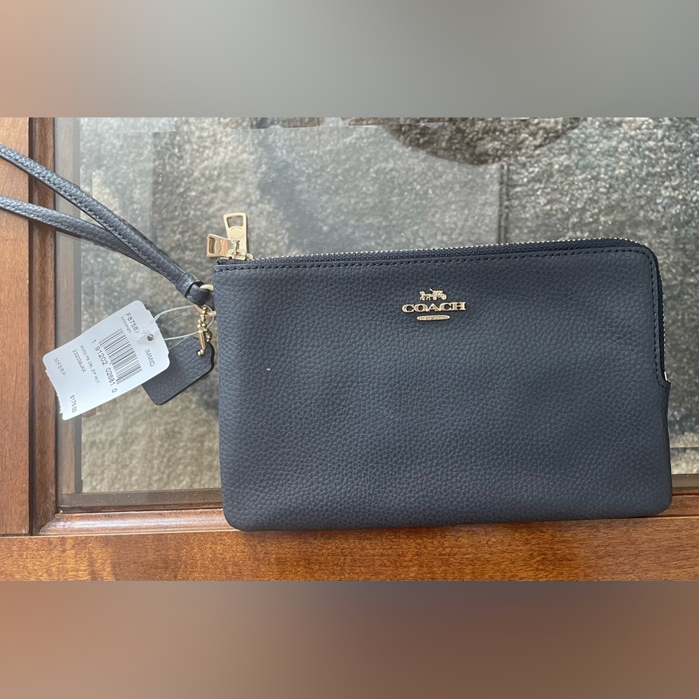 Double zipper wristlet. Pebbled leather
